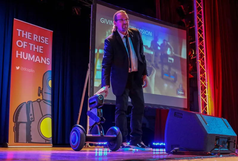 Dave Coplin presenting The Rise of the Humans keynote on stage